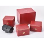 Cartier, a red leather watch box