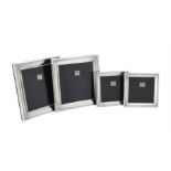 Four silver mounted square photo frames