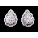 A pair of diamond cluster earrings