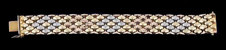 An Italian three colour broad bracelet by Gino Marchiori