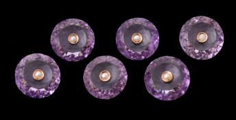 A suite of six Late Victorian amethyst and seed pearl buttons