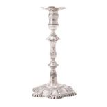 A George III cast silver candlestick by John Cafe