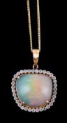 An opal and diamond cluster pendant