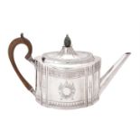 A George III Irish silver shaped oval tea pot