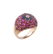 A ruby, sapphire and diamond bombé ring