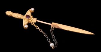 A late 19th century French ruby and half pearl sword jabot pin