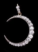 A Victorian diamond crescent pendant