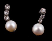 A pair of diamond and pearl ear pendants