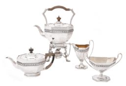 A silver matched four piece octagonal tea set by Edward Barnard & Sons Ltd.