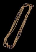 An early 20th century amethyst and rock crystal ropetwist long chain