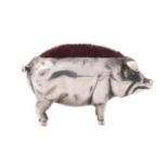 An Edwardian silver novelty pig pin cushion by Sydney & Co.