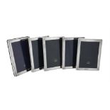 Five silver mounted rectangular photo frames by Kitney & Co.