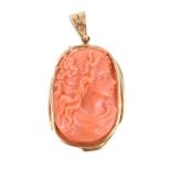 Y An 18 carat gold coral pendant