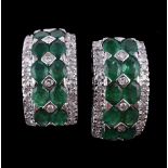 A pair of emerald and diamond earrings