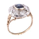 A diamond and sapphire cluster ring