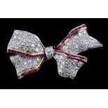 A ruby and diamond bow brooch