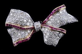 A ruby and diamond bow brooch