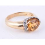 A citrine and diamond ring