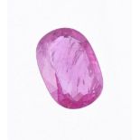 † An unmounted oval cut pink sapphire