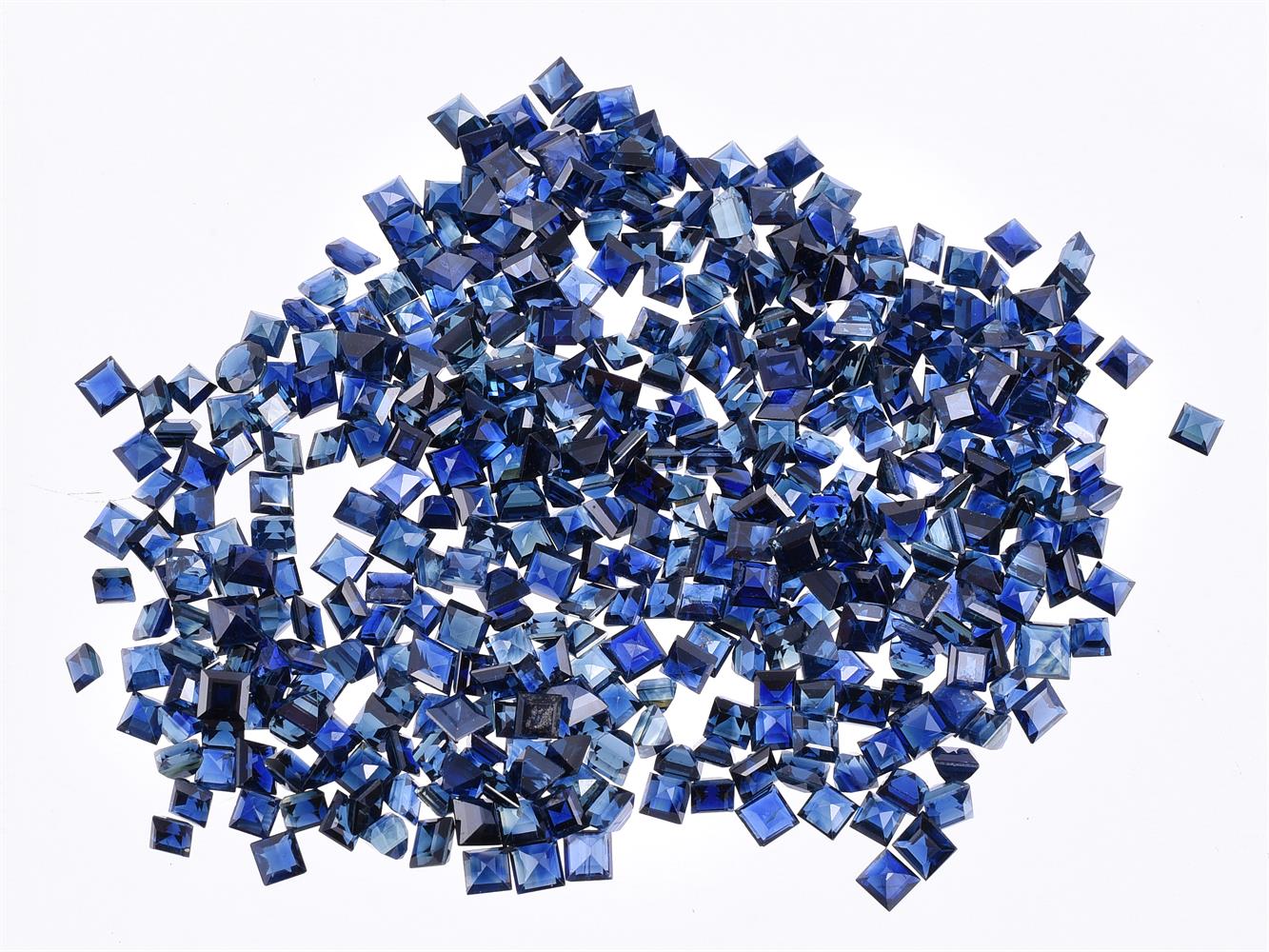 † A packet of unmounted mixed cut sapphires