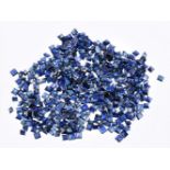 † A packet of unmounted mixed cut sapphires