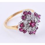 A diamond and synthetic ruby cluster ring