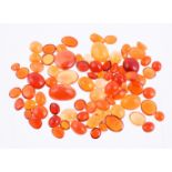 † A packet of oval cabochon fire opals