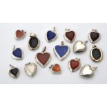 A collection of silver and silver coloured heart lockets