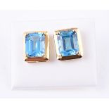 A pair of blue topaz earrings