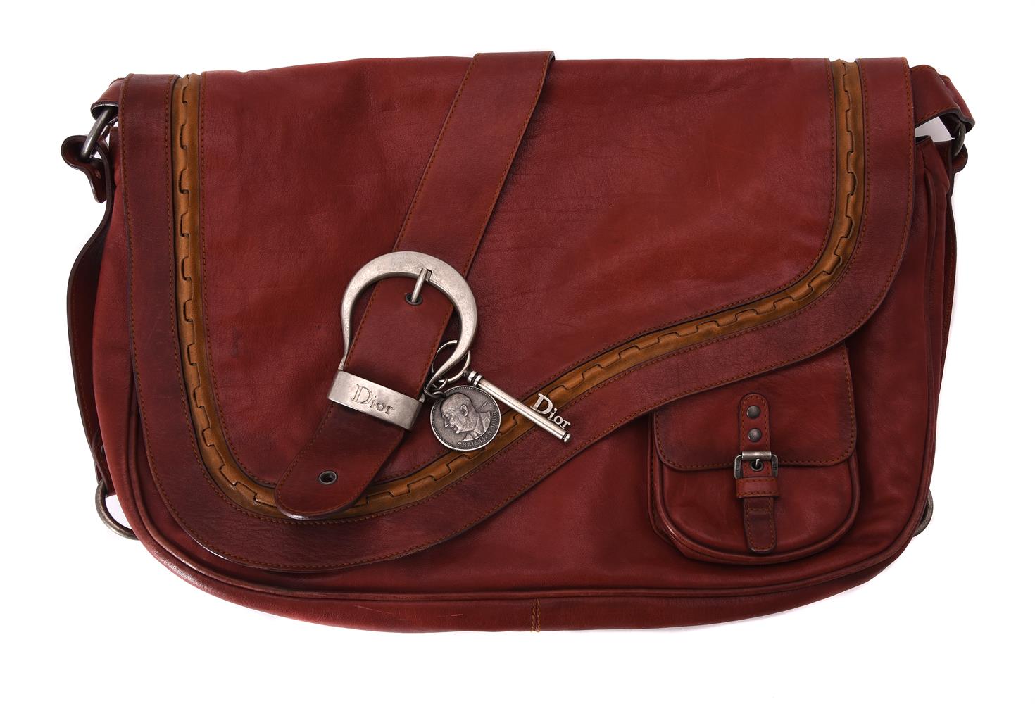 Dior, Gaucho, a red leather saddle bag