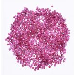 † A packet of circular cut rubies