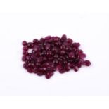 † A parcel of oval cabochon rubies