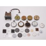 A collection of watch dials and pocket watches