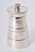 A silver tapering pepper grinder by William Suckling Ltd.