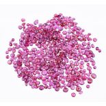 † A packet of mixed cut rubies