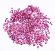 † A packet of mixed cut rubies