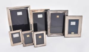Seven silver mounted rectangular photo frames