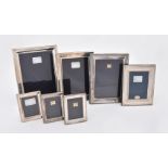 Seven silver mounted rectangular photo frames