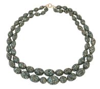 An early 20th century turquoise matrix bead necklace