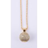 A diamond orb pendant