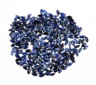 † A packet of unmounted marquise cut sapphires