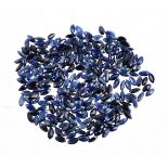 † A packet of unmounted marquise cut sapphires