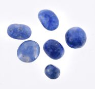 † A packet of six cabochon sapphires