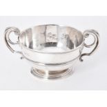 An Edwardian silver twin handled bowl by William Comyns