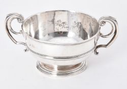An Edwardian silver twin handled bowl by William Comyns