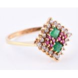 A diamond, ruby and emerald cluster dress ring