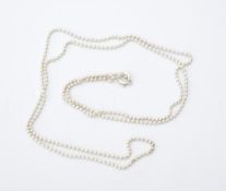 A collection of approximately 60 silver coloured ball chain necklaces