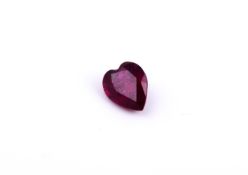 † A heart cut unmounted ruby