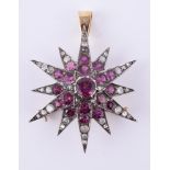 An garnet and diamond star brooch/pendant