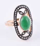 A rose cut diamond and green stone dress ring
